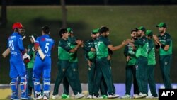 اعضای تیم های کریکت افغانستان و پاکستان