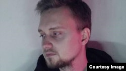 Орусиялык активист Алексей Рожков .