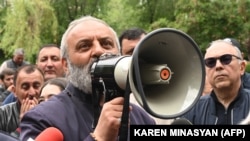 ARMENIA - Archbishop Bagrat Galstanian addresses demonstrators in Yerevan, May 14, 2024.