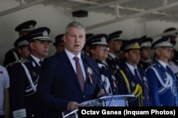Cătălin Predoiu, prezent la un eveniment al Poliției în 2023, cu ocazia depunerii jurământului absolvenților școlii de Poliție.