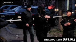 Armenia - Officers cordon off a police station in Yerevan, March 24, 2024.