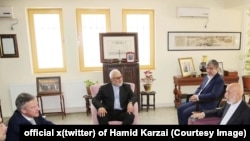 د کرزي او پوټزل له لیدنې یو انځور