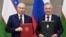 Президент России Владимир Путин и президент Узбекистана Шавкат Мирзиеев в Ташкенте. Узбекистан, 27 мая 2024 года.