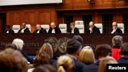 Судді Міжнародного суду ООН під час оприлюднення рішення у справі України проти Росії стосовно порушення Конвенцій щодо протидії фінансуванню тероризму та расової дискримінації, 31 січня 2024 року