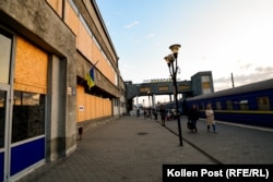 The Mykolayiv train station, boarded up but still running