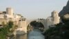Bosnia -- policemen guard the newly built bridge
