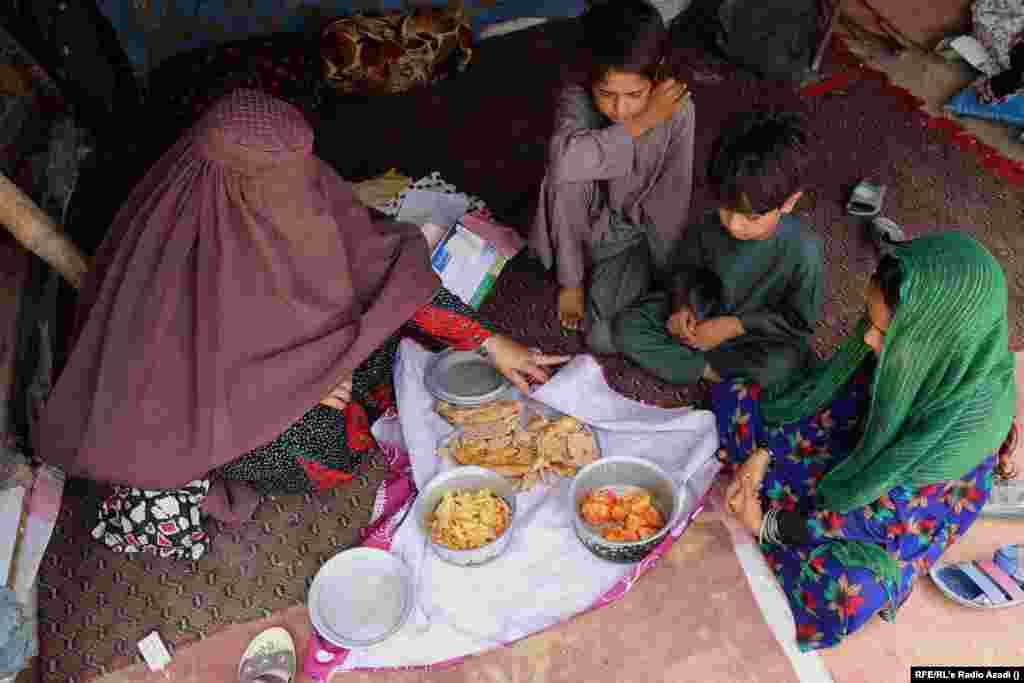 Pashtana, a widow, also lives in Kandahar city. She and her three children eat potatoes for lunch. Pashtana used to beg until it was banned in the city by the Taliban. The militant group provides her with a bag of flour, rice, and cooking oil each month. But she says this does not meet the family&rsquo;s needs.
