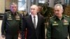 Од лево кон десно - Началникот на Руската армија Валери Герасимов, претседателот Владимир Путин и министерот за одбрана Сергеј Шојгу