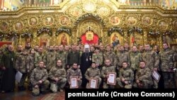 Глава ПЦУ митрополит Київський і всієї України Епіфаній під час зустрічі з українськими воїнами в Михайлівському Золотоверхому соборі, де він провів молебень за Перемогу України над агресором. Київ, 6 січня 2023 року