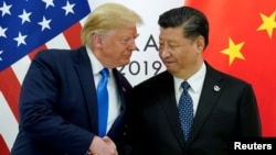 US President Donald Trump meets Chinese leader Xi Jinping in 2019 at the G20 leaders summit in Japan, the last time the two leaders met in-person. 
