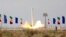An Iranian rocket carrying a satellite is launched in 2020.