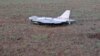 FILE PHOTO: A damaged drone lies after falling in the eastern Polish village of Czosnowka