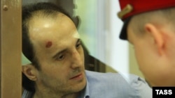 Юсуп Темирханов. На нем следы избиения полицией (архивное фото)