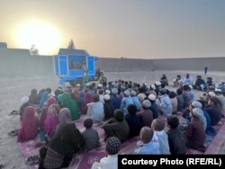 Wesa brings his mobile school and library to children in Kandahar in May 2022.