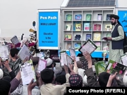 Wesa hosts his mobile school and library campaign in Kandahar. (file photo)