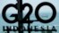 Корабль проплывает мимо знака во время саммита лидеров G20 в Нуса-Дуа, на индонезийском курортном острове Бали, 15 ноября 2022 года