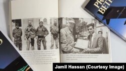 عبدالجمیل حسن حین انجام وظیفه با شماری از مقام‌های امریکایی و افغان