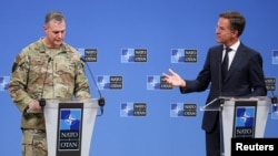 NATO chief Mark Rutte (right) holds a joint news conference with US General Alexus Grynkewich, NATO's supreme allied commander Europe.