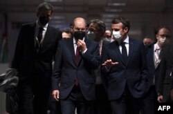 Olaf Scholz vrea fără export de arme, iar Macron vrea o soluție europeană și nu americană la criza din Ucraina
