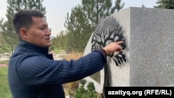 Kosai Makhanbaev, who was wounded during the January events, shows where the shooting took place. October 29, 2025