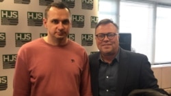 Колишній політв'язень Олег Сенцов і канадський аналітик Маркус Колга