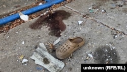 Personal items litter the site where a Russian missile hit a queue of pensioners in the village of Yarova on September 9.