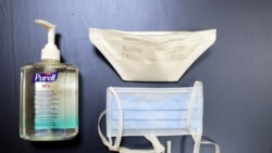 د کرونا ویروس څخه د وقایعې لپاره ماسکونه او مکروب ضد مایع