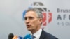 NATO Secretary-General Jens Stoltenberg speaking to journalists at a summit focusing on Afghanistan in Brussels on October 5.