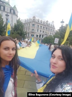 Біженка під час акції на підтримку України