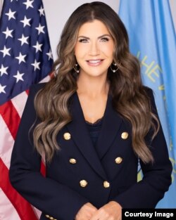 Кристи Ноэм.