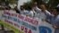 Pakistani students of the Islam-e Jamiat party rally to condemn a meeting organized by the U.S. Embassy supporting gay rights in Islamabad in July.