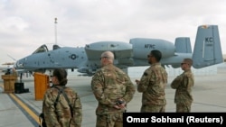 FILE: U.S air force personnel stand by an U.S. A-10 aircraft at the Kandahar airbase in January 2018.