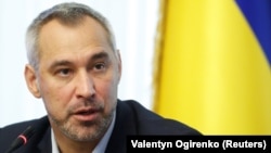 Ukrainian Prosecutor-General Ruslan Ryaboshapka speaks during a news conference in Kyiv on October 4.