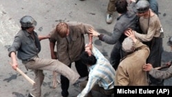 Piața Universității, București, 14 iunie 1990.