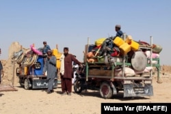 Displaced families returning to their villages in Helmand.