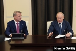 Герман Греф и Владимир Путин