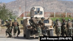 Afghan Army soldiers attend a training session in Herat on September 24.