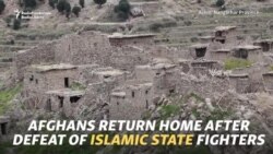 Islamic State Prisoners Shown To Media As Afghans Return To Ruins