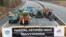 „Macron, răspunde-ne!”, îndeamnă participanții la blocada de pe o autostradă franceză, lângă Paris, la 30 ianuarie. 