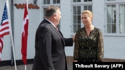 U.S. Secretary of State Mike Pompeo is greeted by Danish Prime Minister Mette Frederiksen in Copenhagen on July 22. 