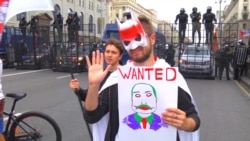 Участник одной из акций протеста в Минске