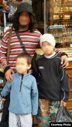 Сирияға кеткен оралдық отбасы (әкесі және оның екі ұлы Әмзе мен Асан).