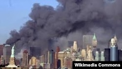 Smoke billows out of the burning World Trade Center towers before their collapse in New York on September 11, 2001.