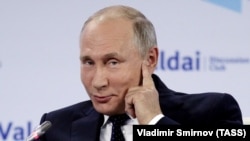 Владимир Путин на Валдайском форуме год назад
