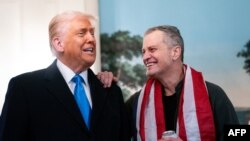 Президентът на САЩ Доналд Тръмп и американският учител Марк Фогъл, който беше освободен от руски затвор. 11 февруари 2025 г.