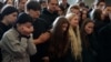 Funeral Held For Teenager, Parents Killed in Russian Strike On Kyiv GRAB 1