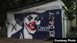 Перерисованный мурал, посвященный Нурсултану Назарбаеву. Алматы, 8 июля 2021 года  