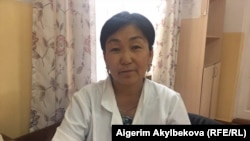 Кымызай Кыдыралиева.