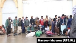 The bodies of Bismillah Adil Aimaq's family members who were killed on the night of February 25 were brought to the Ghor governor's office the following day. 