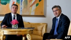 Президент Хорватії Зоран Міланович (л) і прем’єр-міністр Хорватії Андрей Пленкович